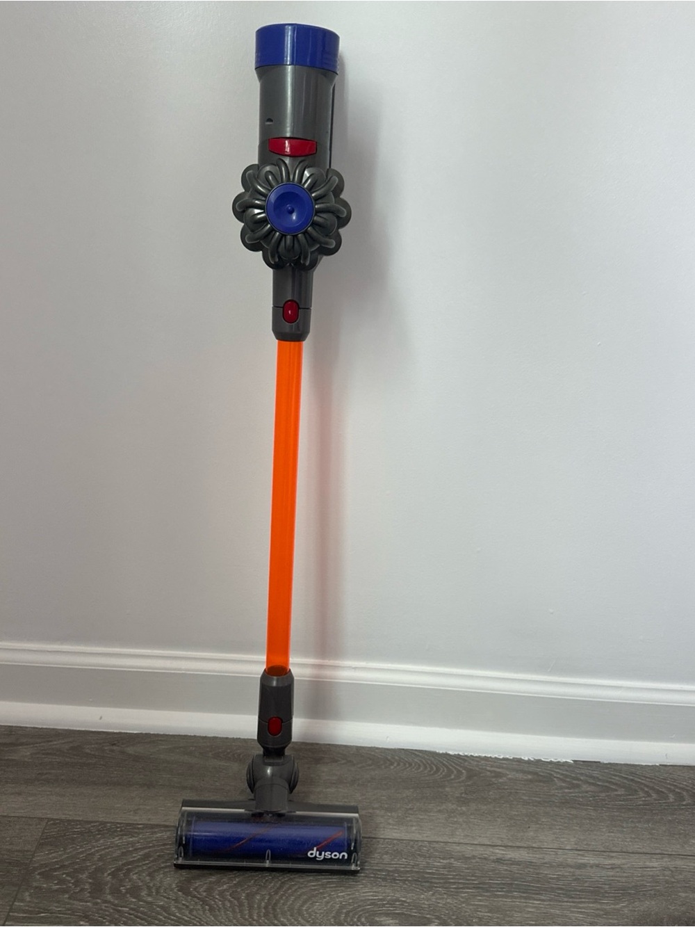 Dyson Kids Stick Vacuum Toy in Gray, Blue and Orange